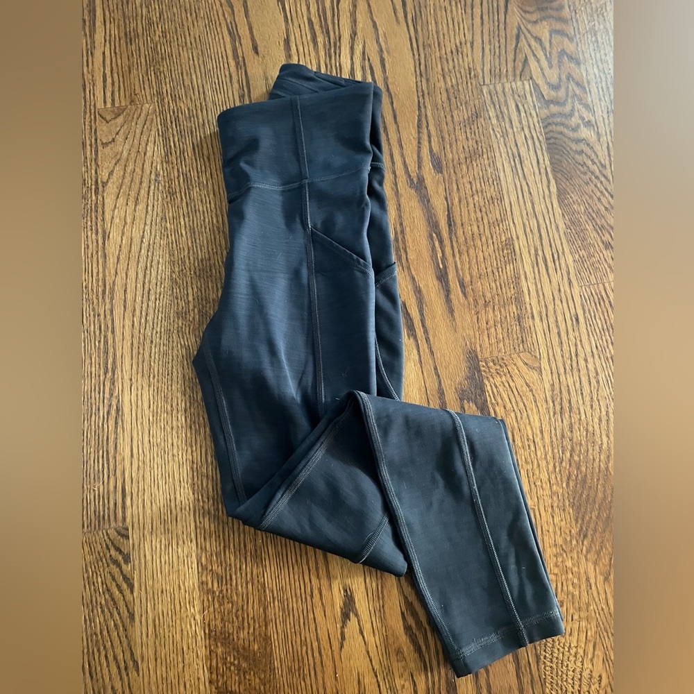 Women’s Lululemon WU train dark heather grey leggings. Size 2. 25” inseam